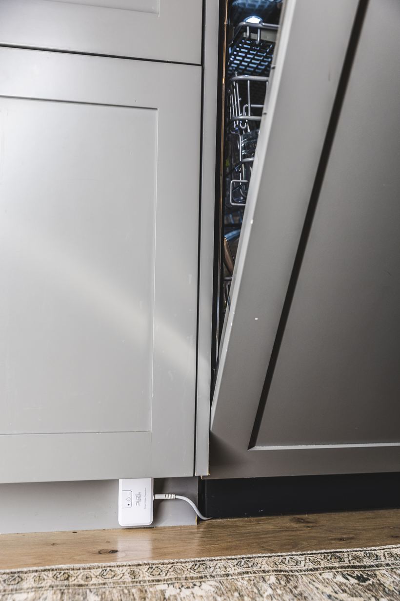 PuzL Detect at the toe kick beside a dishwasher